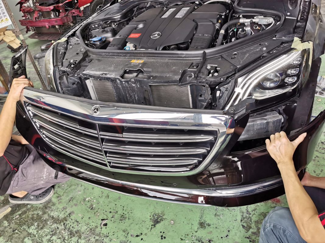 Polishing the new paint on the S320L to bring up the shine.