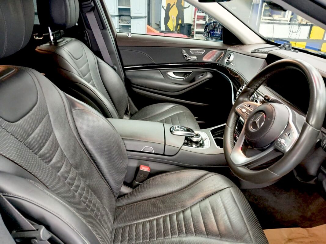 The Mercedes-Benz S320L parked in the workshop, freshly coated.