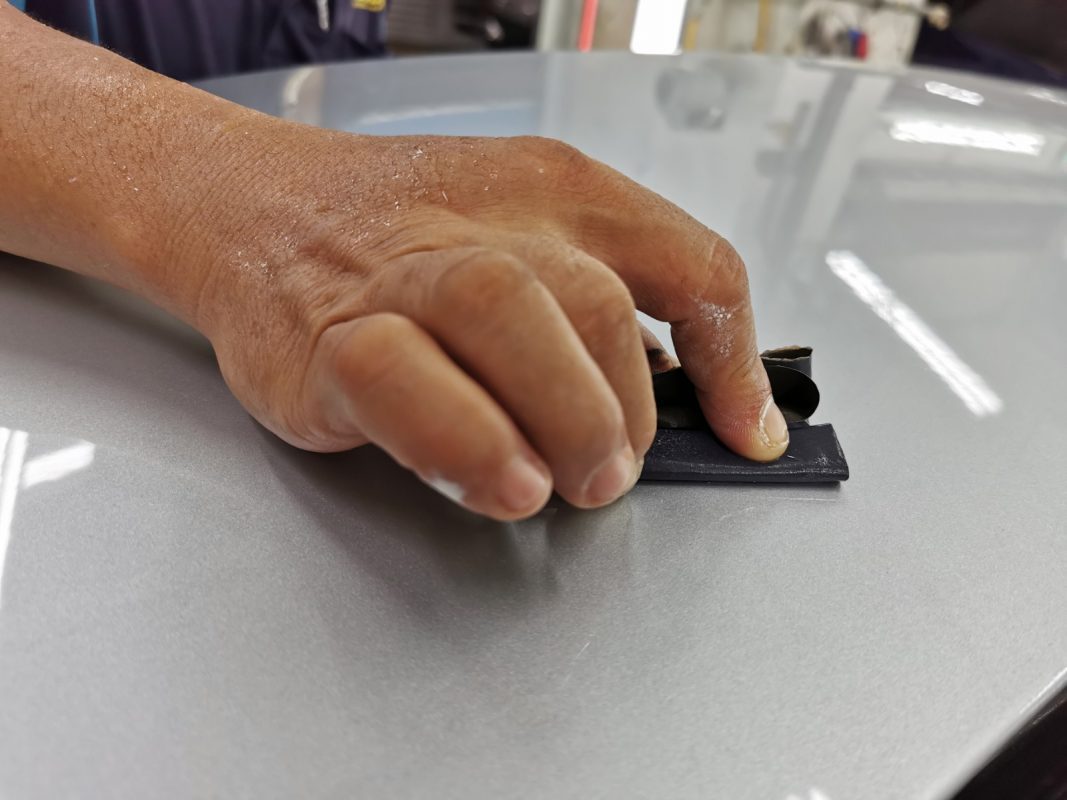The S350L after spraying, being sanded back for an even surface.
