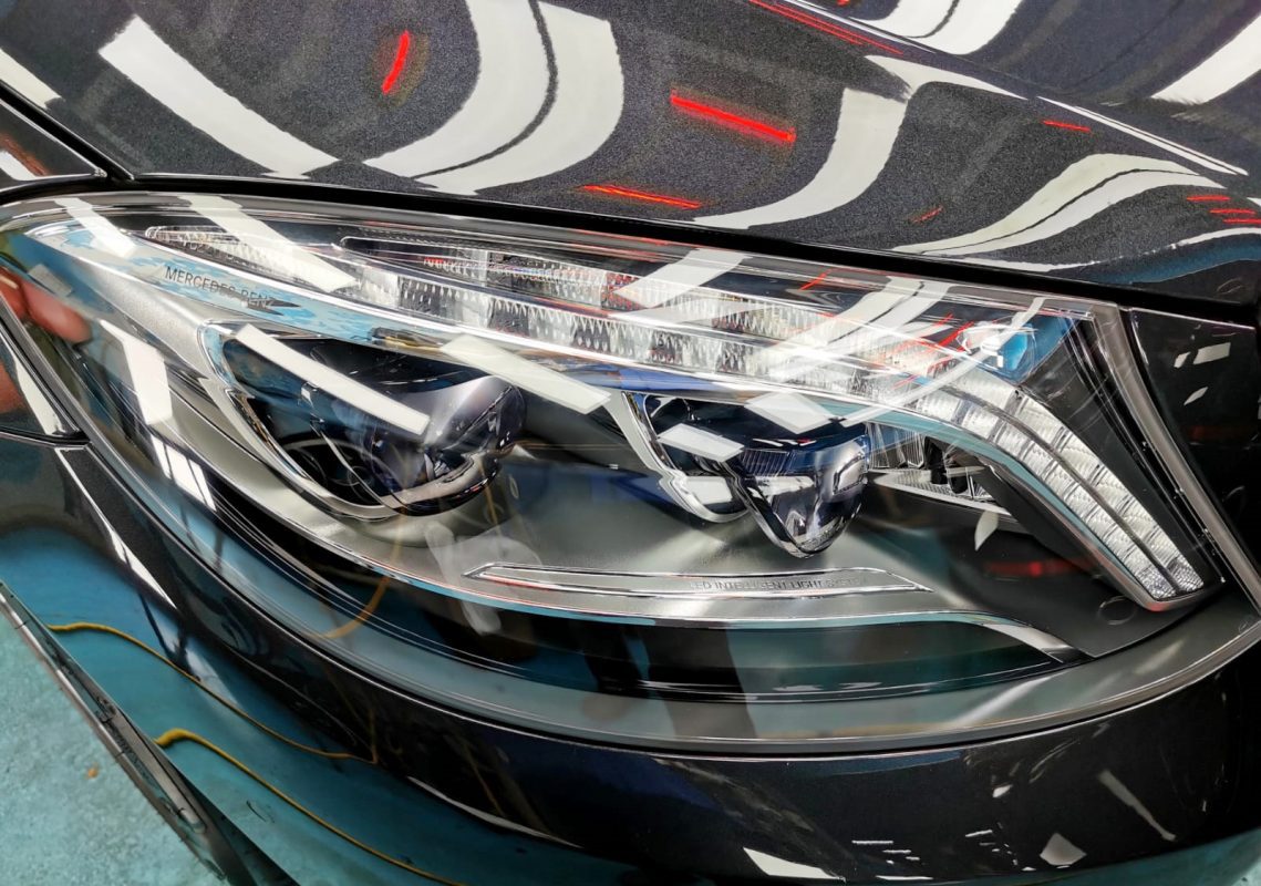 The S400L's coated paintwork showing clean reflections.