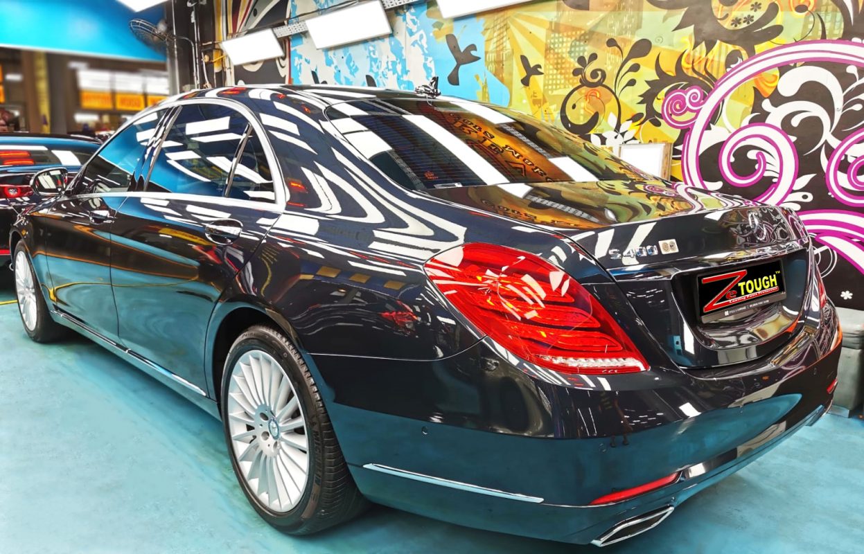 Rear quarter of the S400L, glossy and protected.