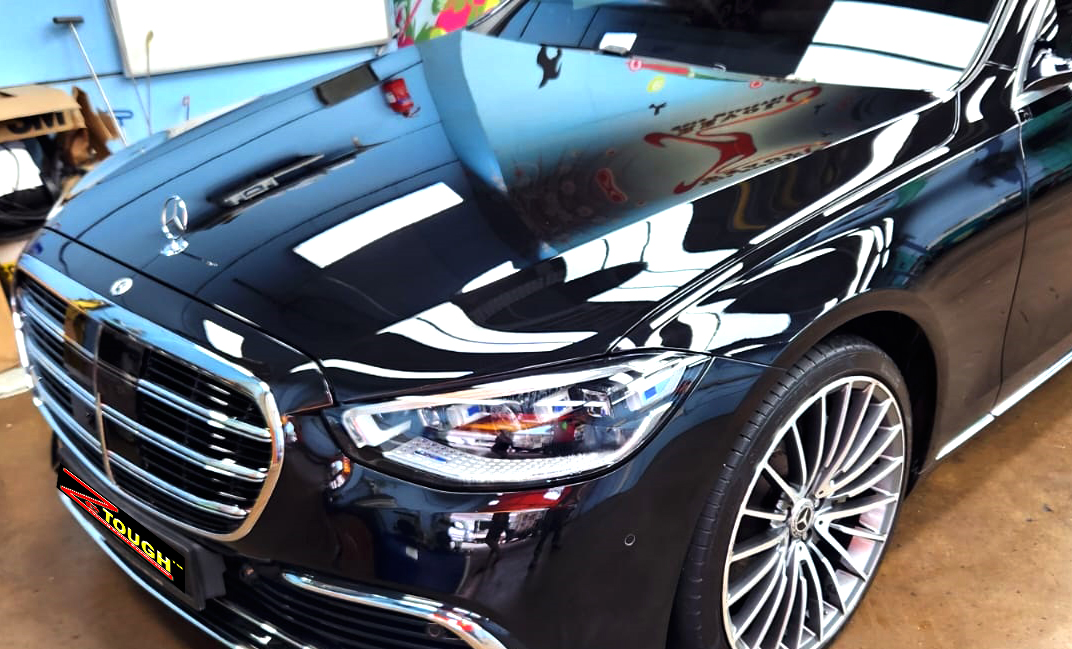 The Mercedes-Benz S450L from a side angle after the ceramic coating.