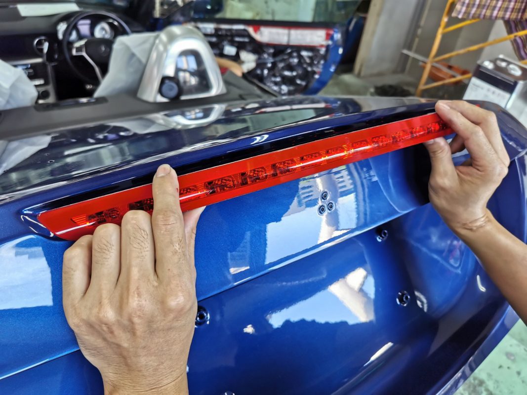 Polishing the new paint on the SLK200 to bring up the shine.