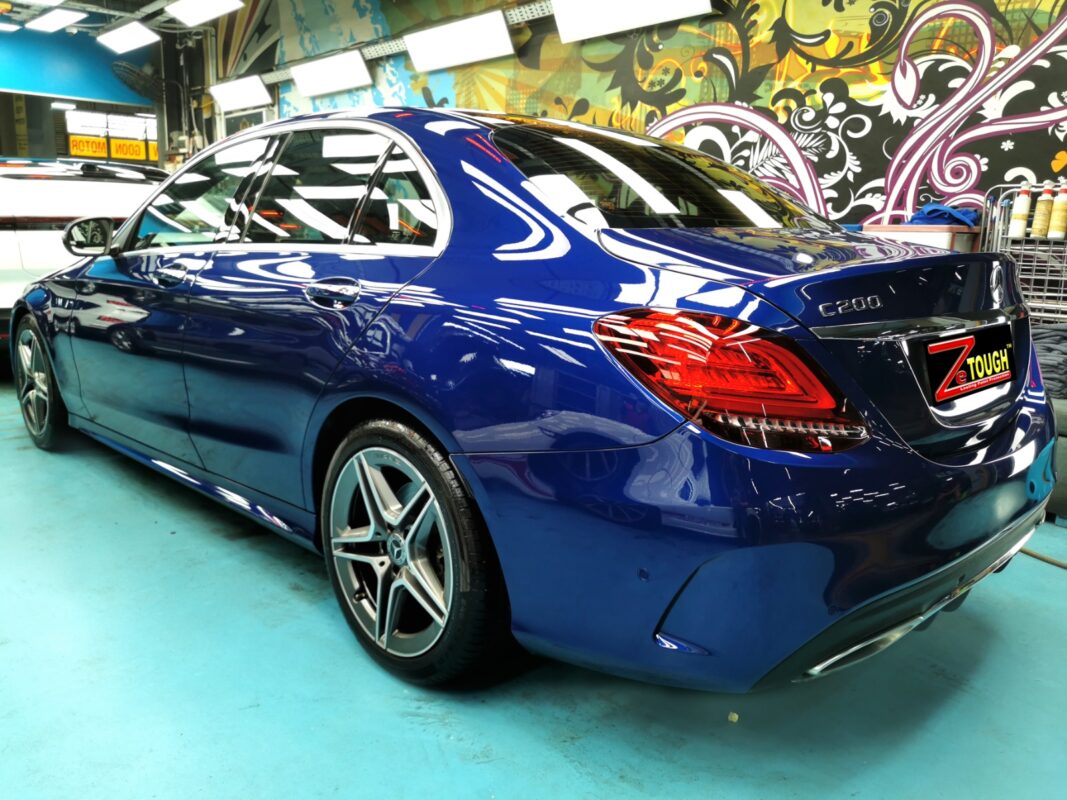 The Mercedes-Benz C200's alloy wheel and brake, cleaned and detailed.