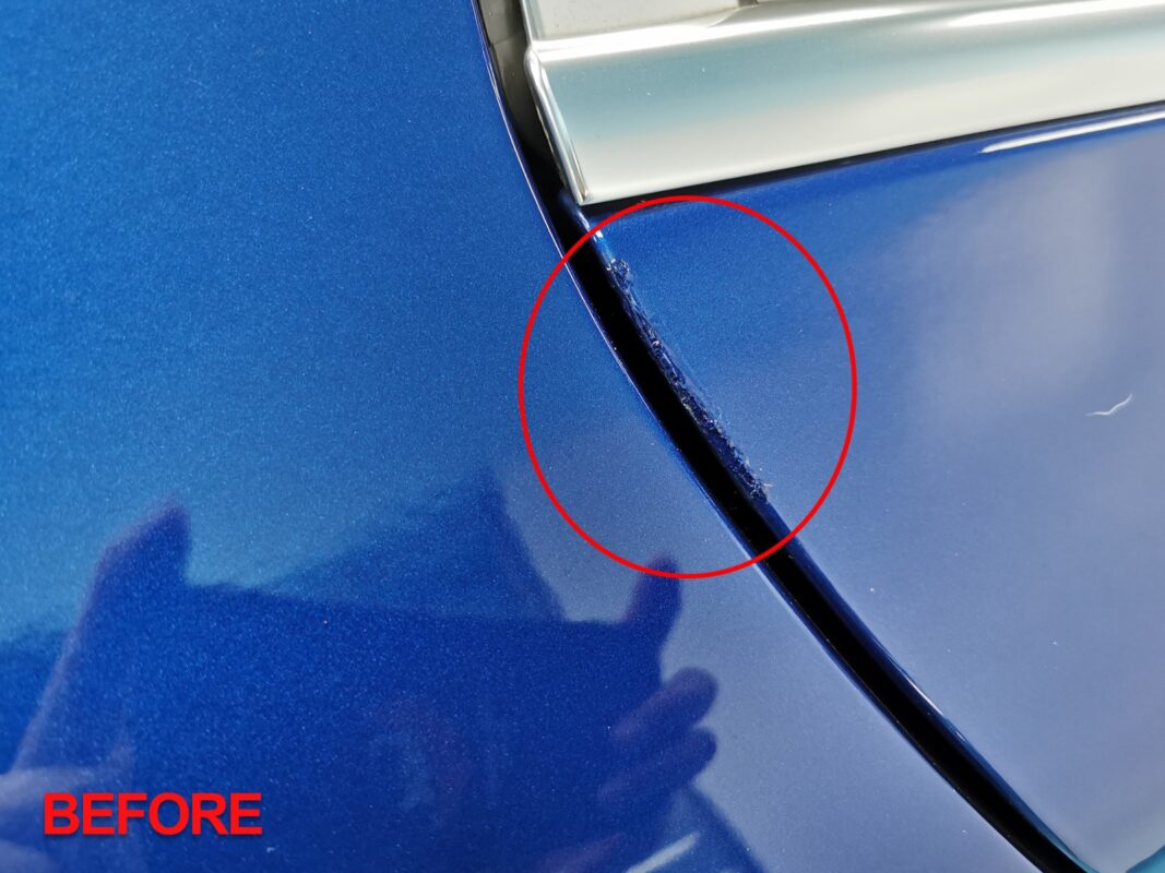 Before: a scratch on the C200's bodywork at the start.