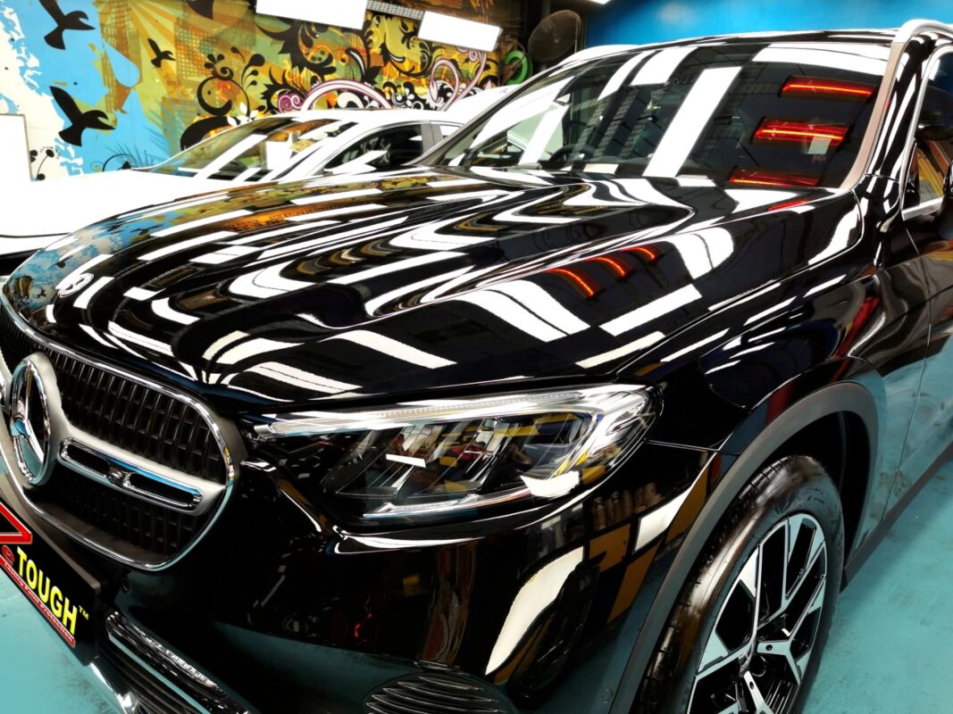 The Mercedes-Benz GLC200's coated paintwork under workshop lighting.