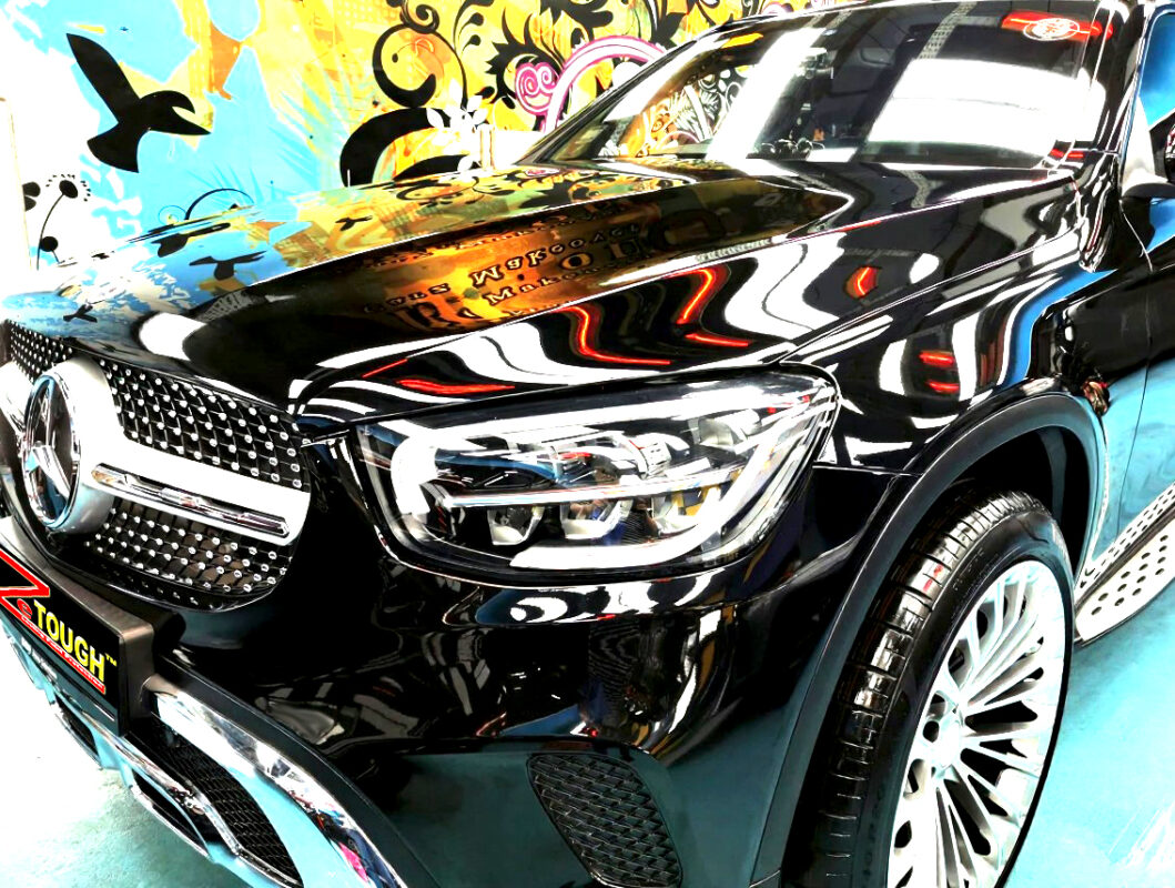 The Mercedes-Benz GLC200's coated paintwork under workshop lighting.