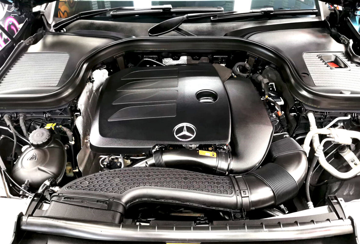 Reflections across the coated panels of the Mercedes-Benz GLC200.