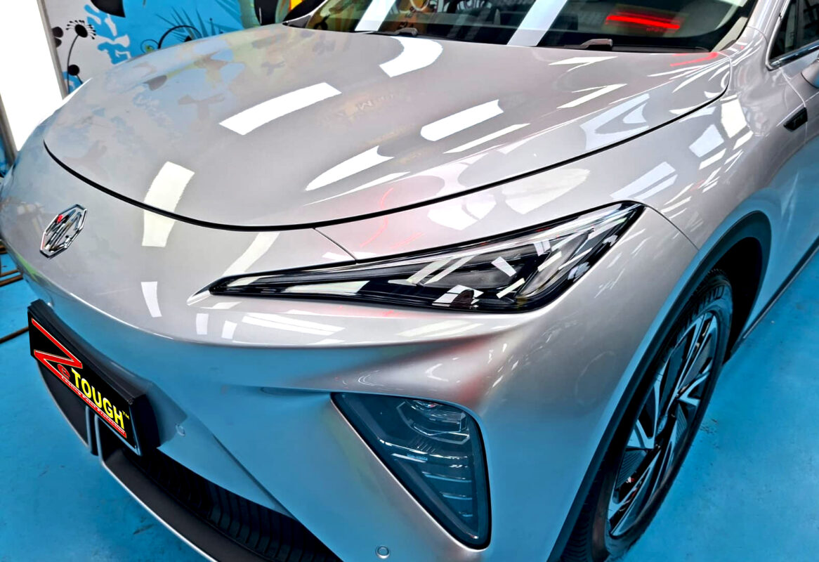 The MG S6's coated paintwork under workshop lighting.