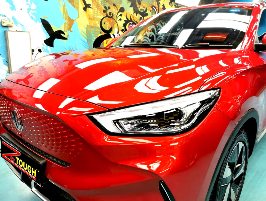 The MG ZS's coated paintwork under workshop lighting.