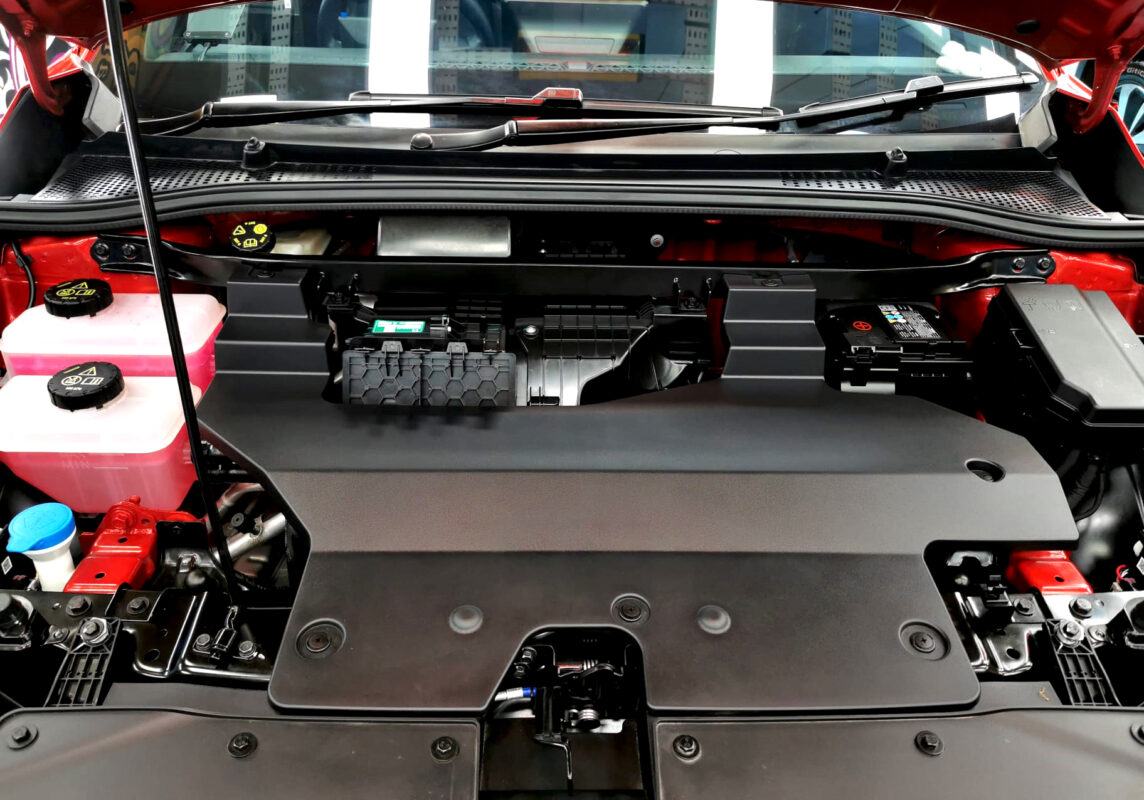 Reflections across the coated panels of the MG4 EV.
