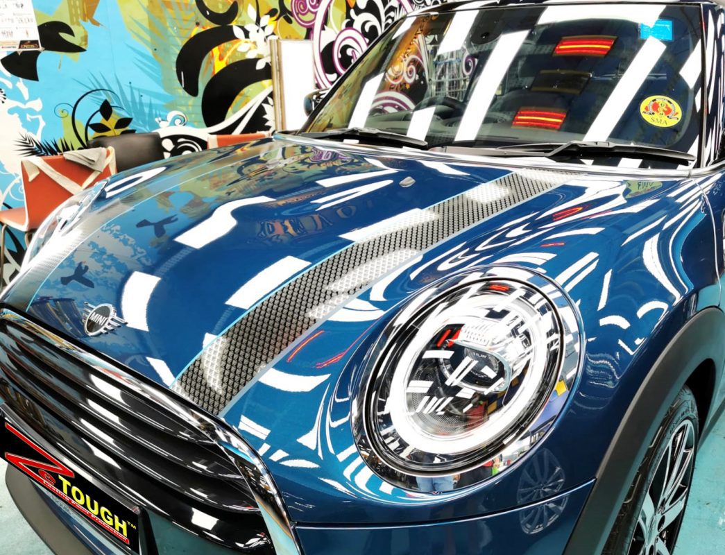 The MINI Cooper Convertible Sidewalk from a side angle after the titanium coating.