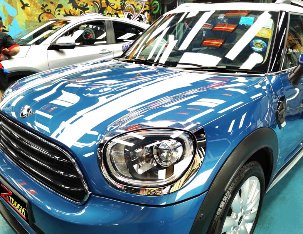 The MINI Cooper Countryman from a side angle after the ceramic coating.