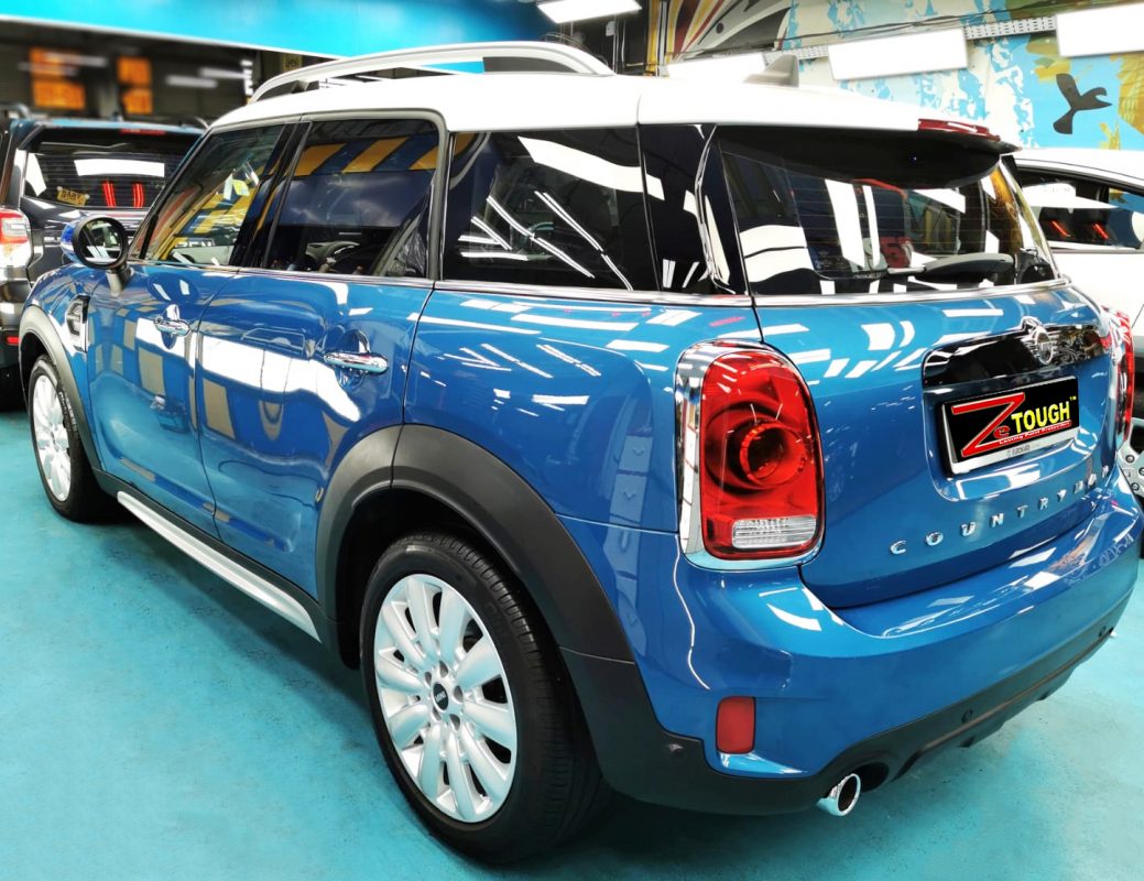 Rear quarter of the Countryman, glossy and protected.