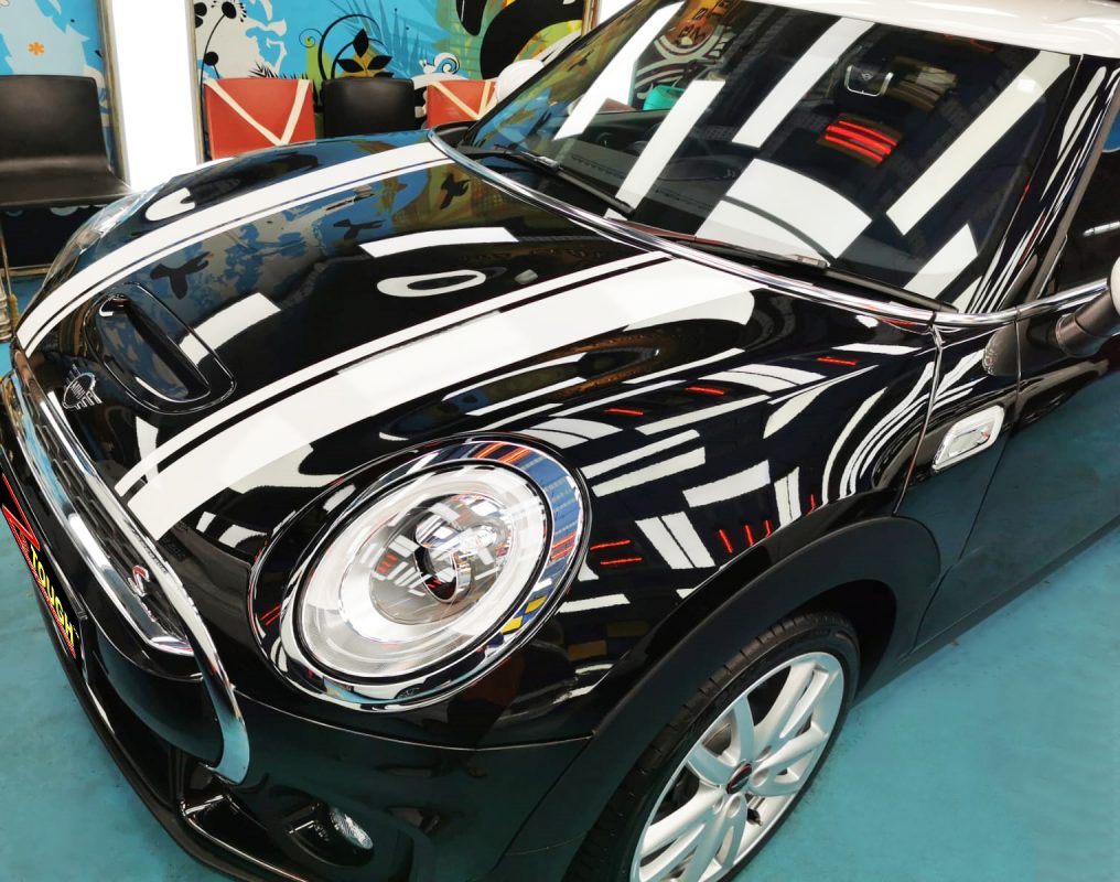 The MINI Cooper from a side angle after the titanium coating.