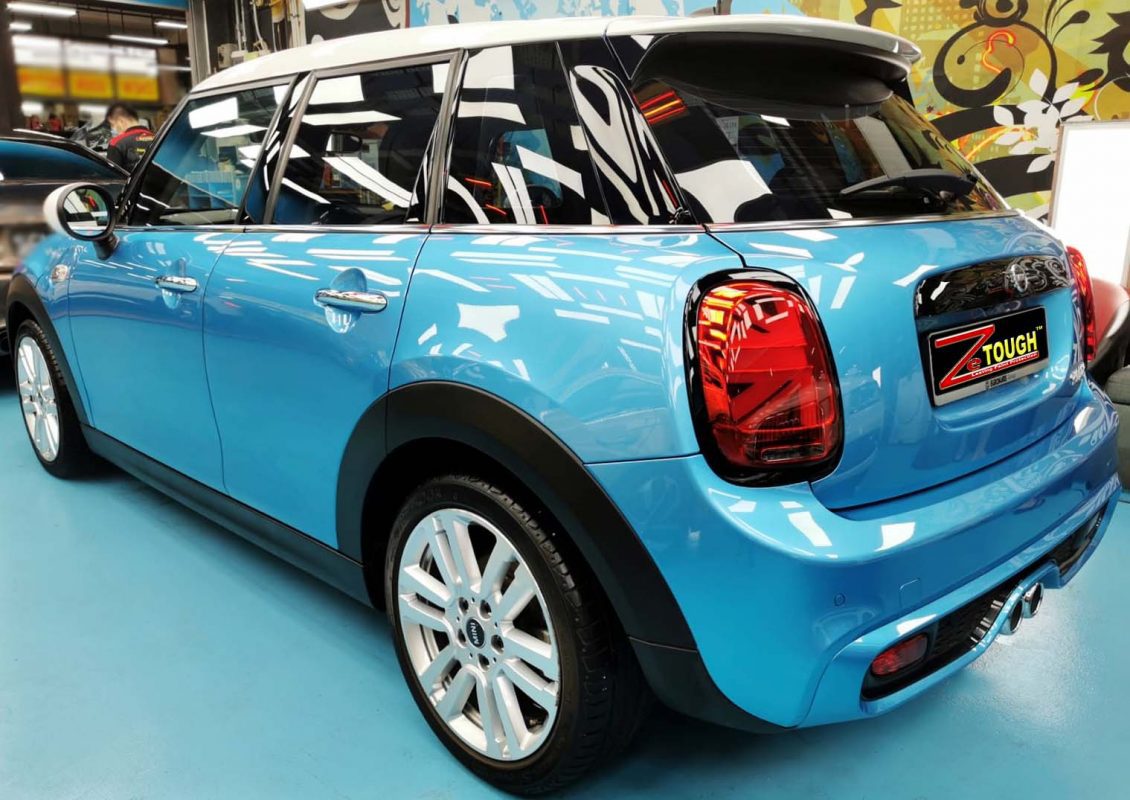 Rear quarter of the MINI Cooper, glossy and protected.