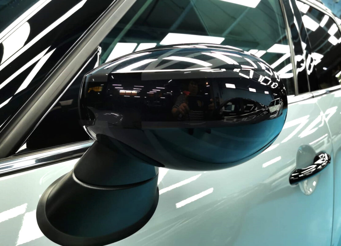 Rear quarter of the Countryman, glossy and protected.