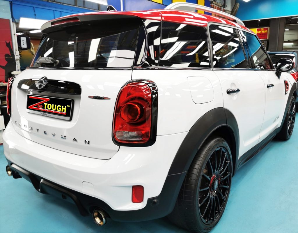 Rear quarter of the MINI Countryman, glossy and protected.
