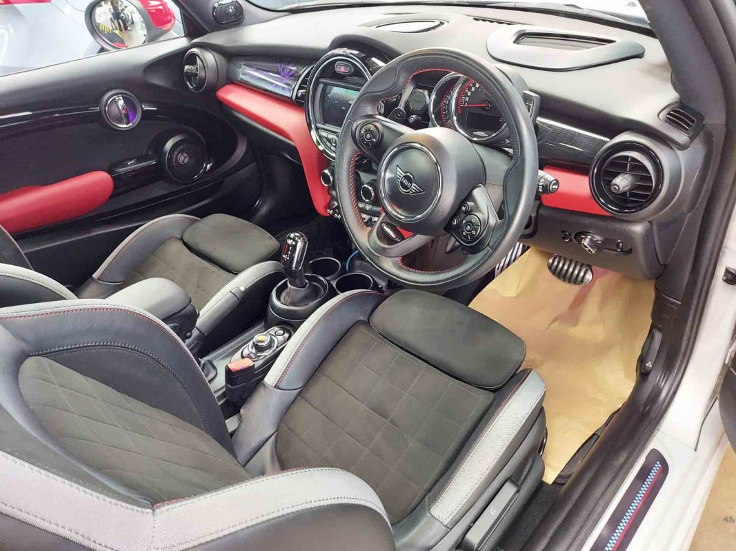 The MINI JCW parked in the workshop, freshly coated.