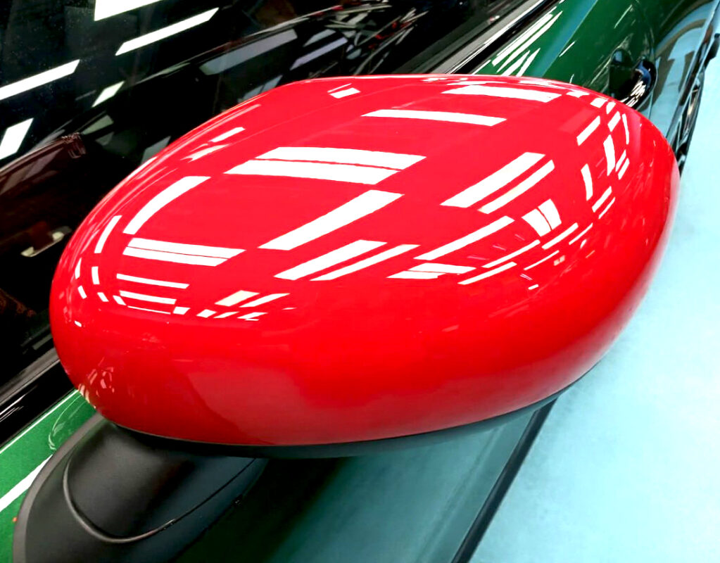 Rear quarter of the John Cooper, glossy and protected.