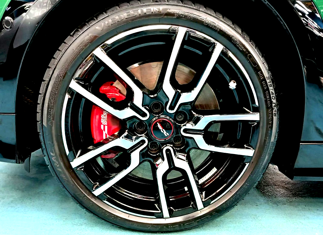 The MINI John Cooper parked in the workshop, freshly coated.