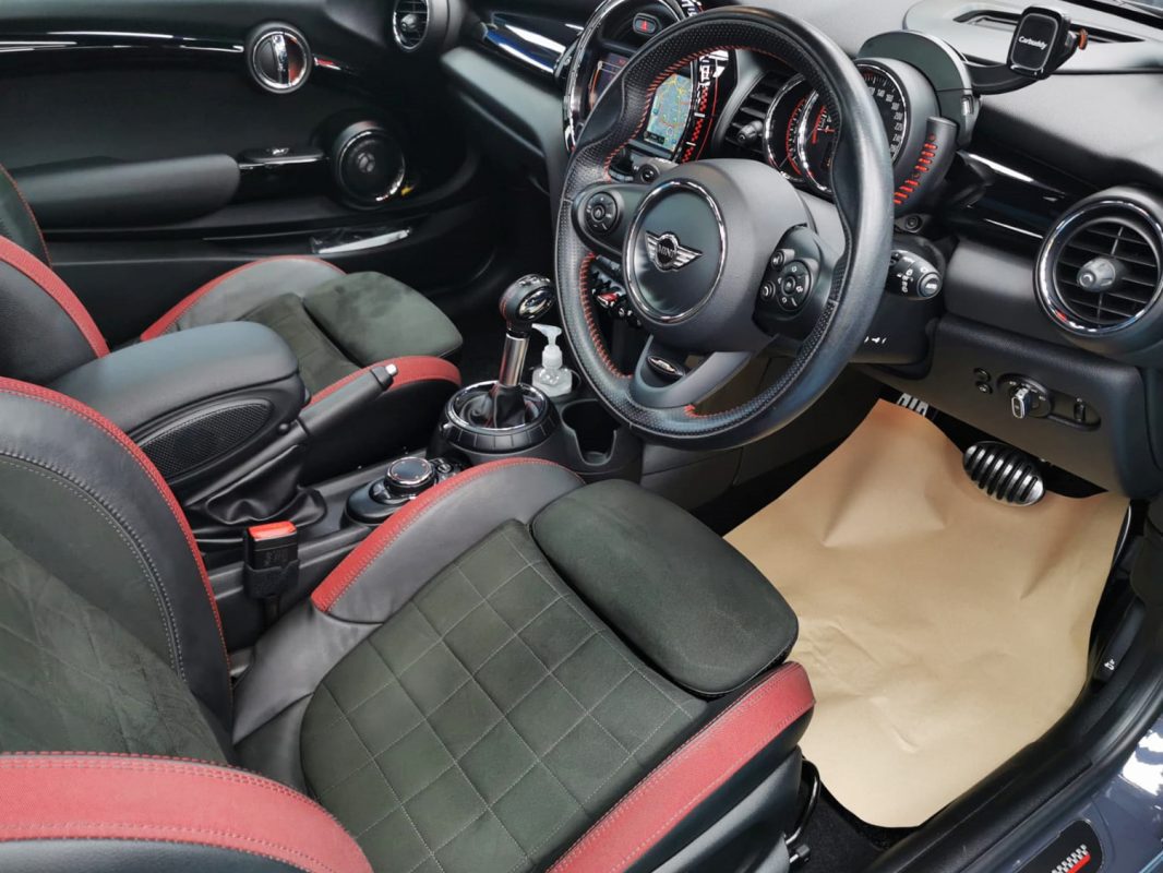 The MINI John Cooper parked in the workshop, freshly coated.