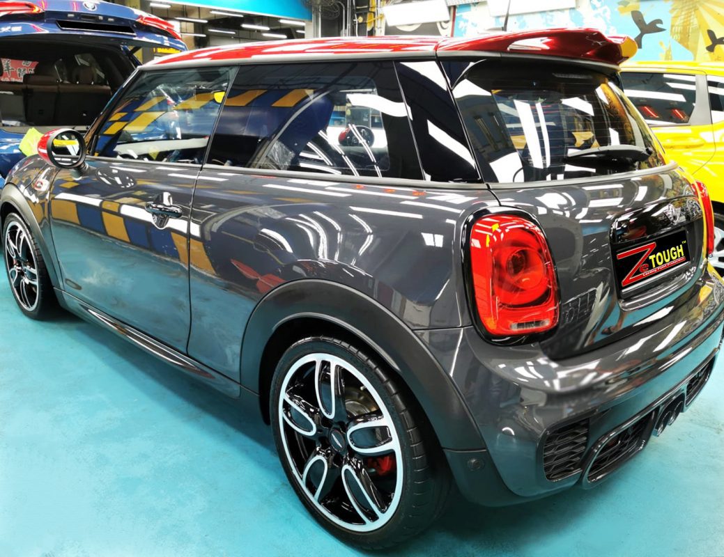 Rear quarter of the MINI John Cooper, glossy and protected.