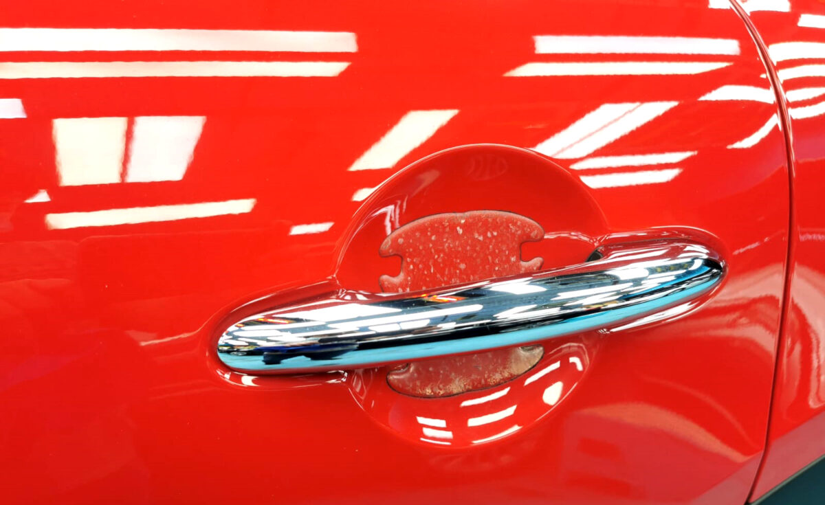 Rear quarter of the MINI One, glossy and protected.