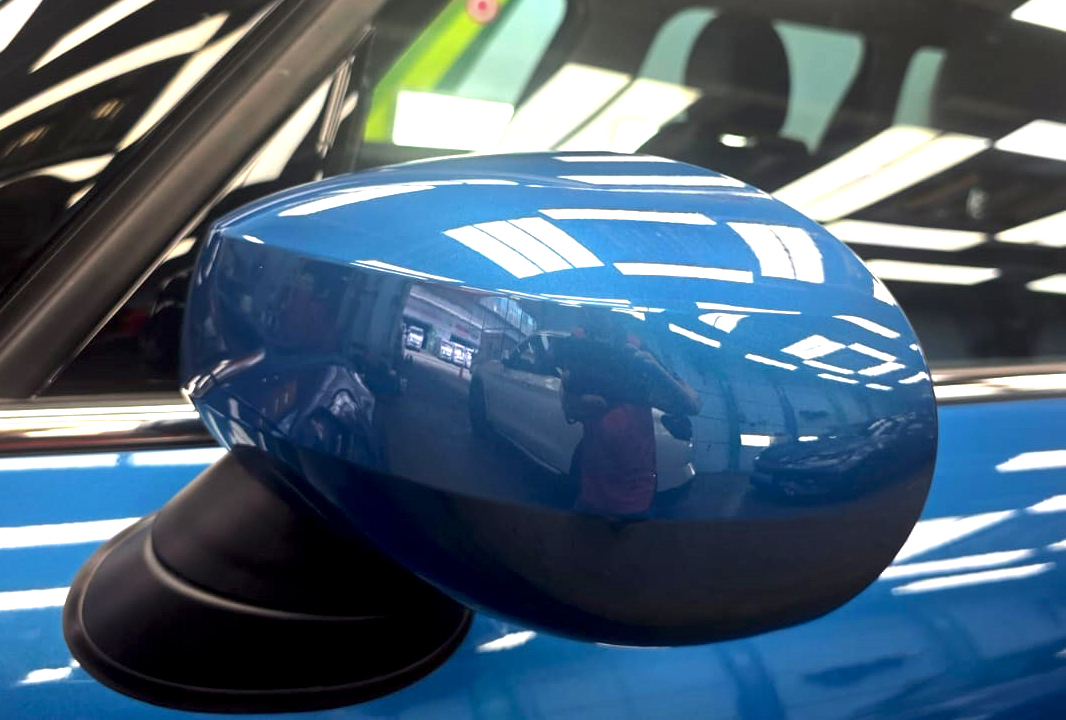 Rear quarter of the MINI One, glossy and protected.