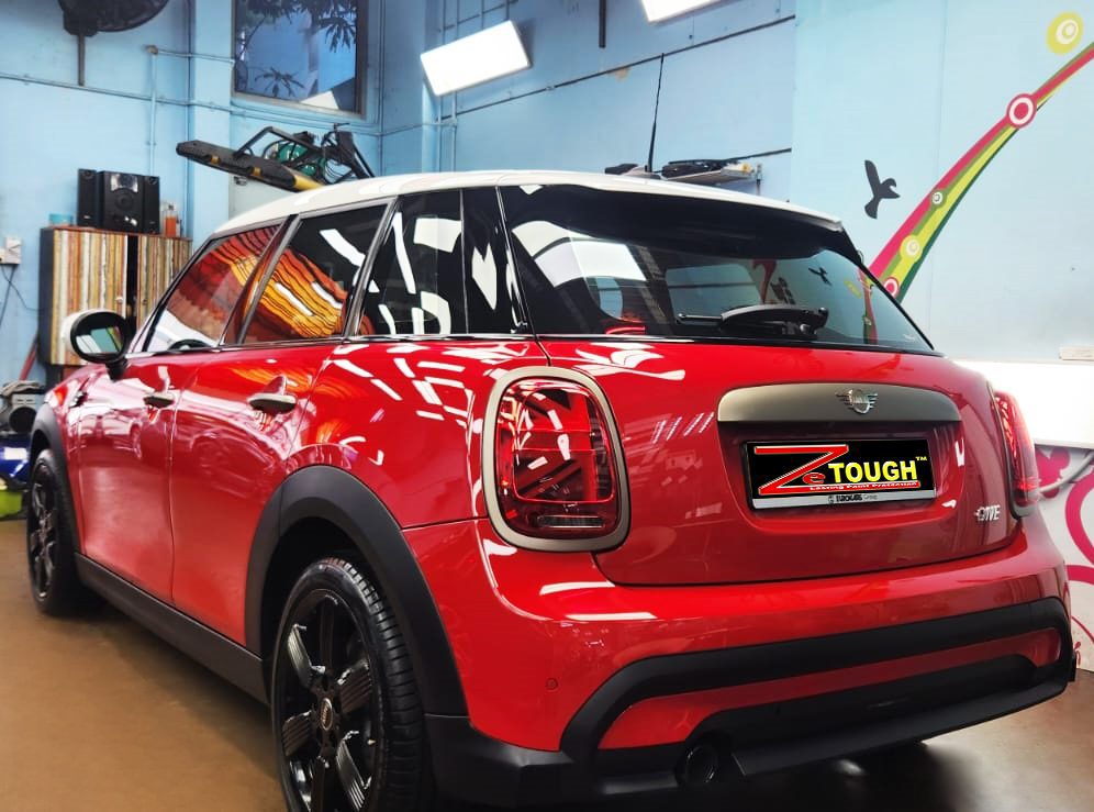 Rear quarter of the MINI One, glossy and protected.
