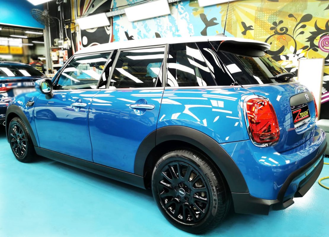 Rear quarter of the MINI One, glossy and protected.