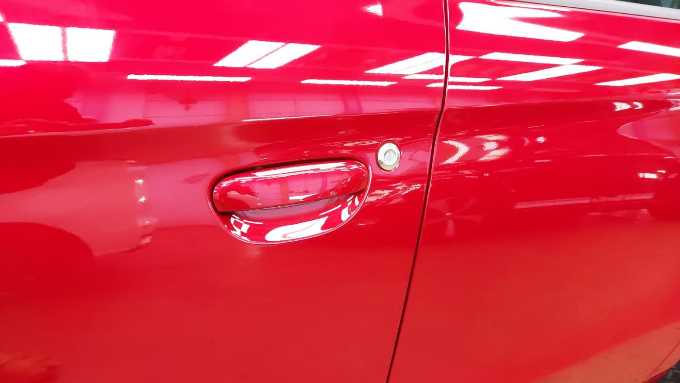Front three-quarter view of the Mitsubishi Attrage after coating.