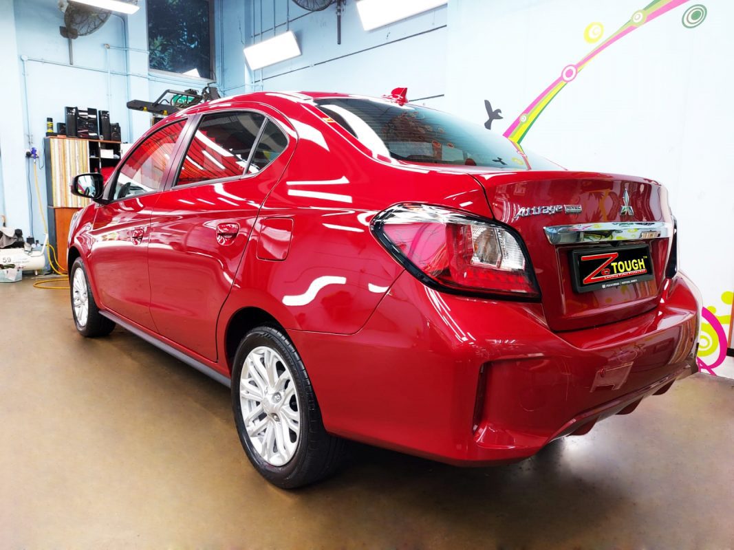 Rear quarter of the Mitsubishi Attrage, glossy and protected.