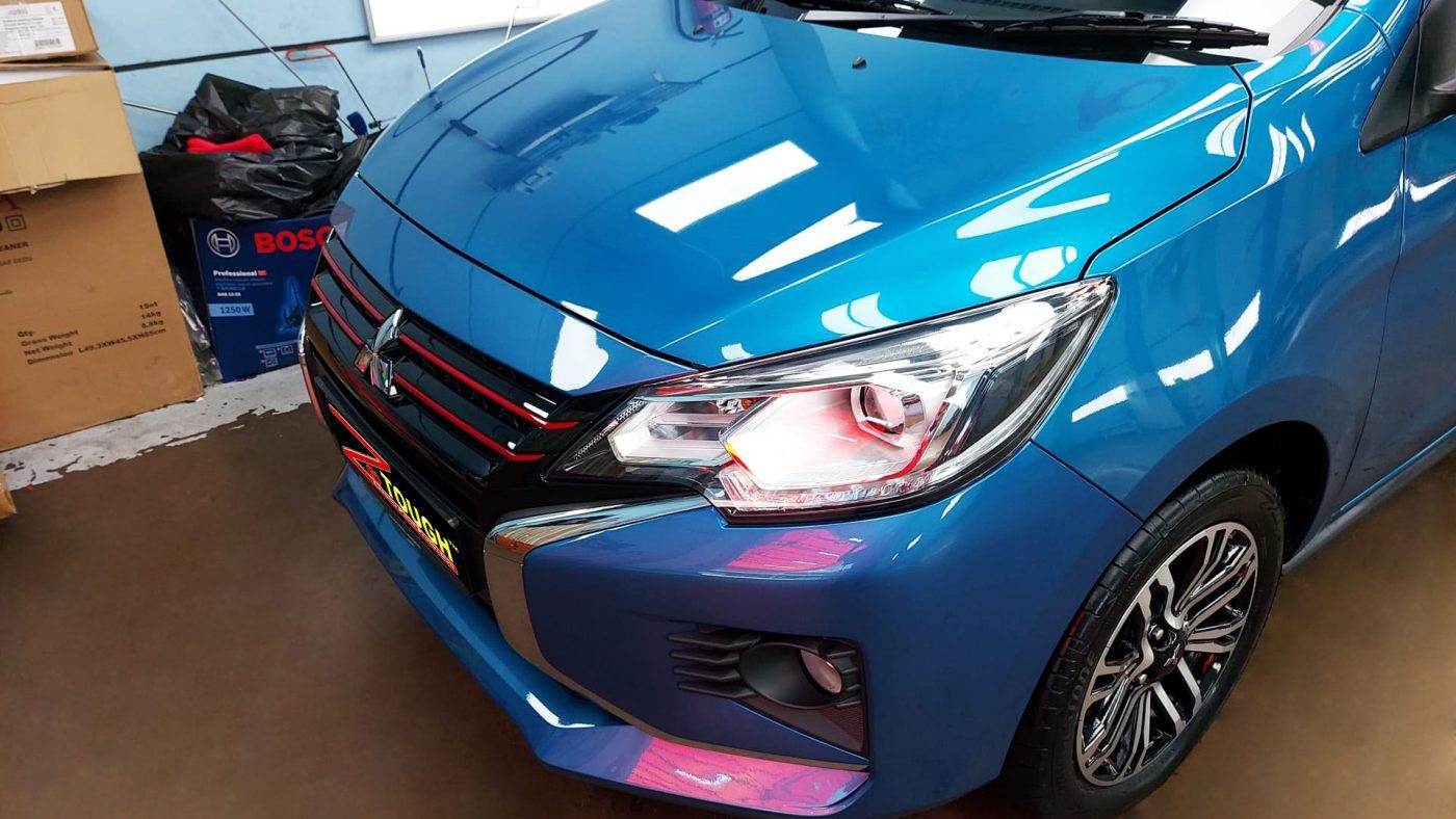 The Mitsubishi Attrage from a side angle after the titanium coating.