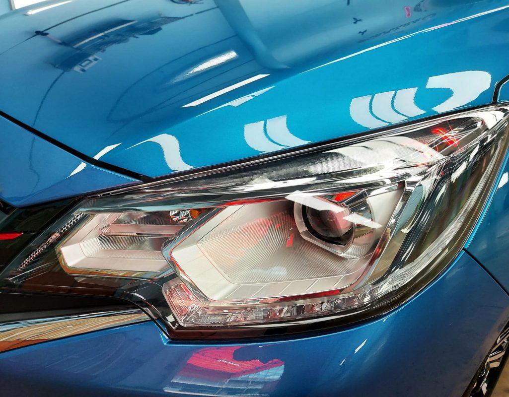 The Attrage's coated paintwork showing clean reflections.
