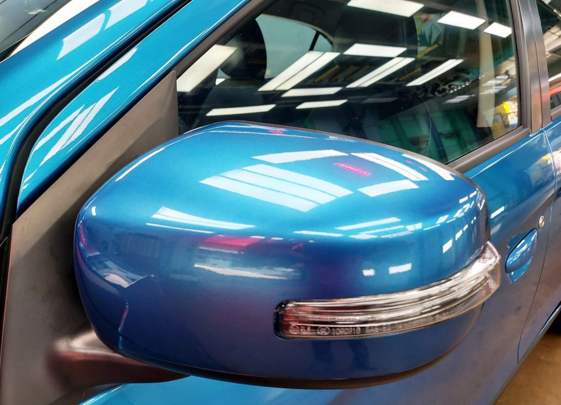 Side panel of the Mitsubishi Attrage with the titanium finish locked in.