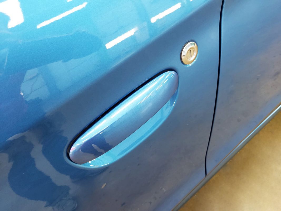 Front three-quarter view of the Mitsubishi Attrage after coating.