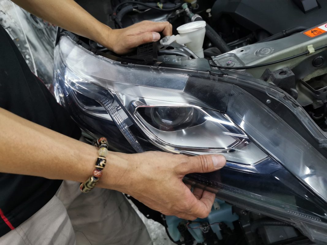 Parts removed from the Eclipse Cross, panels exposed for bodywork.