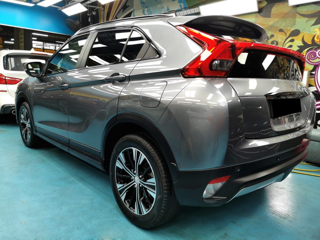 Before: the Mitsubishi Eclipse Cross with its original damaged paintwork.