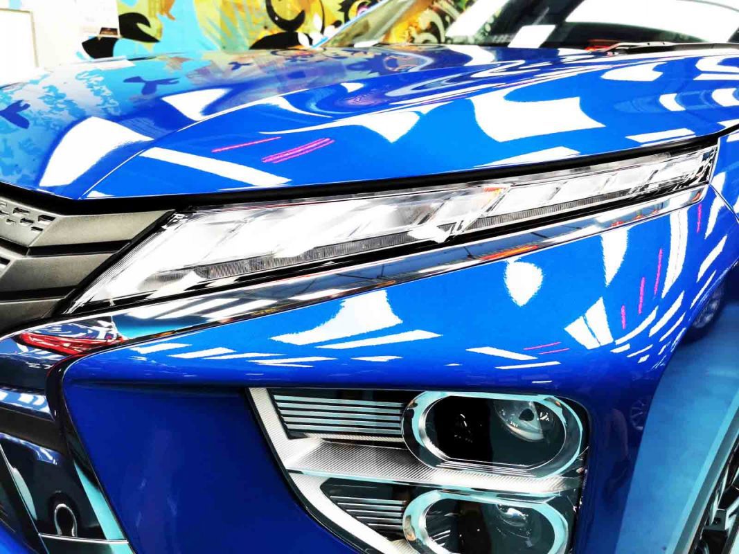 The Eclipse Cross's coated paintwork showing clean reflections.