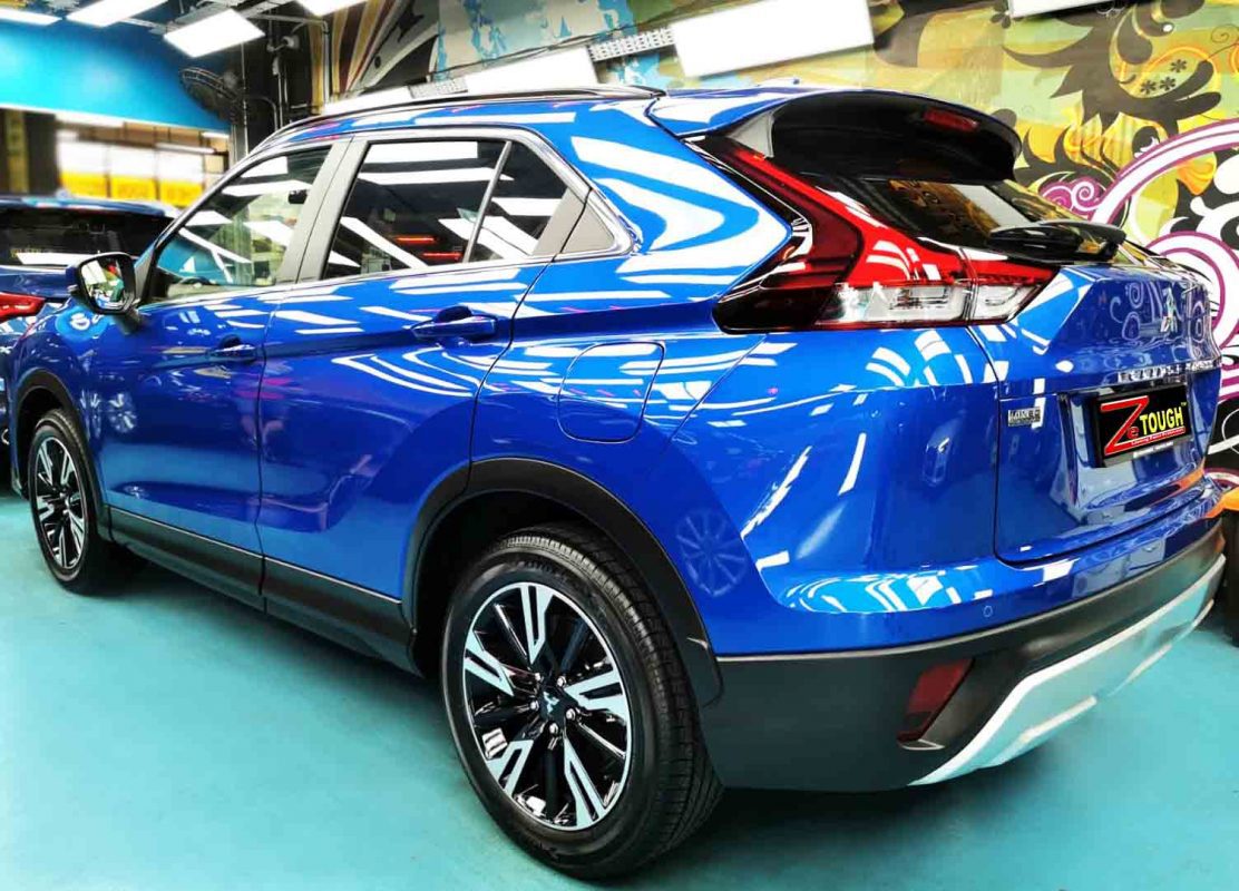 Rear quarter of the Mitsubishi Eclipse Cross, glossy and protected.