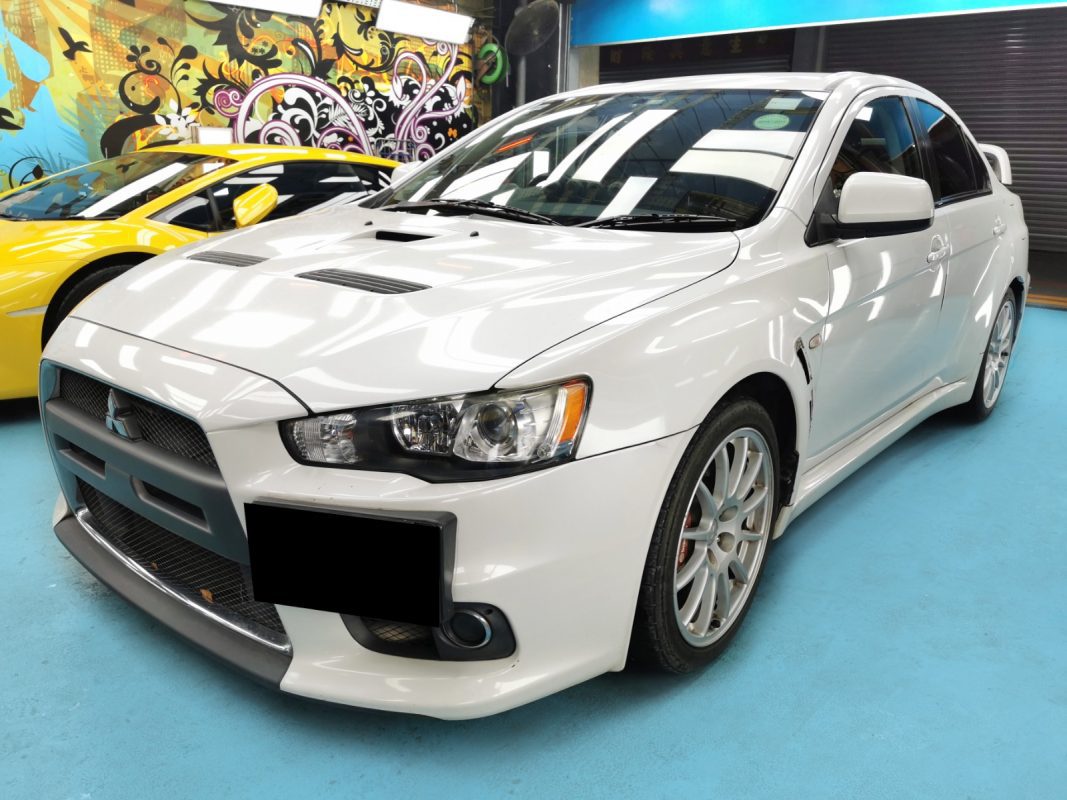 The Mitsubishi Evo as it arrived at Revol Carz before the respray.