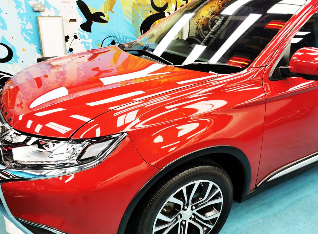 The Mitsubishi Outlander from a side angle after the titanium coating.