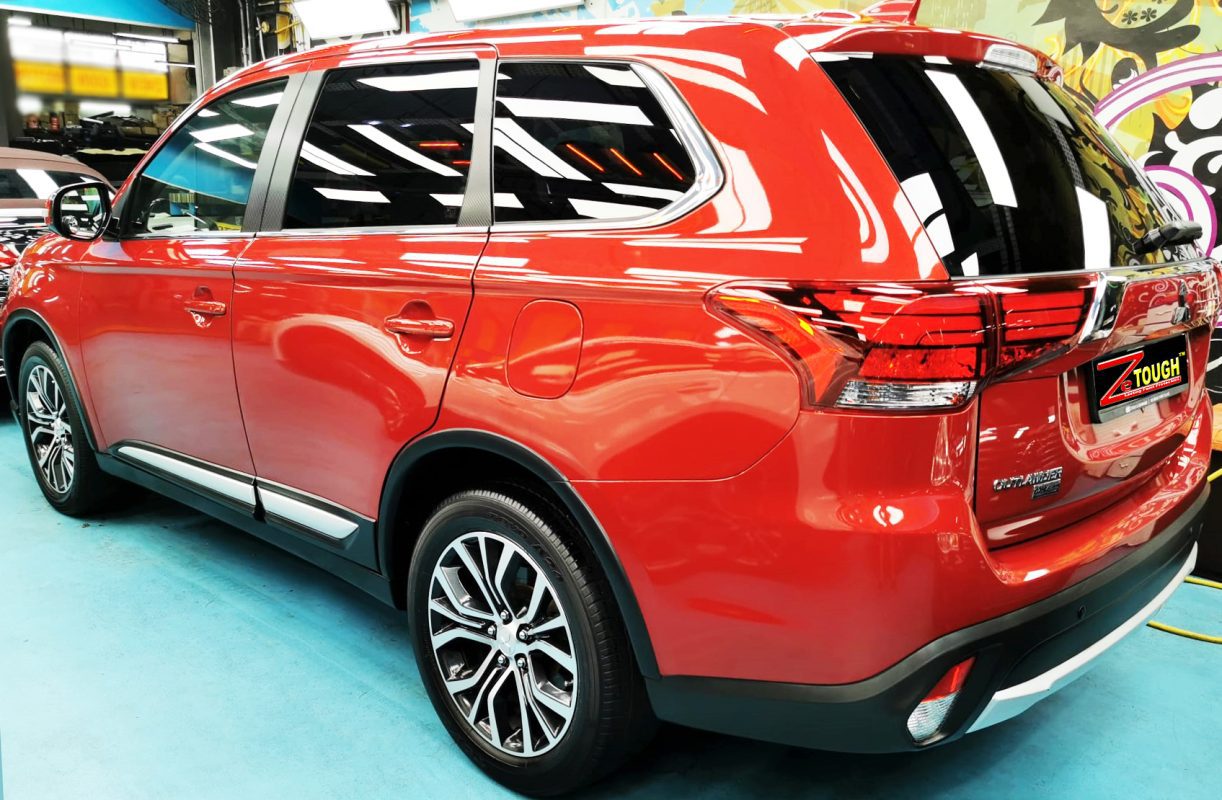 Rear quarter of the Mitsubishi Outlander, glossy and protected.