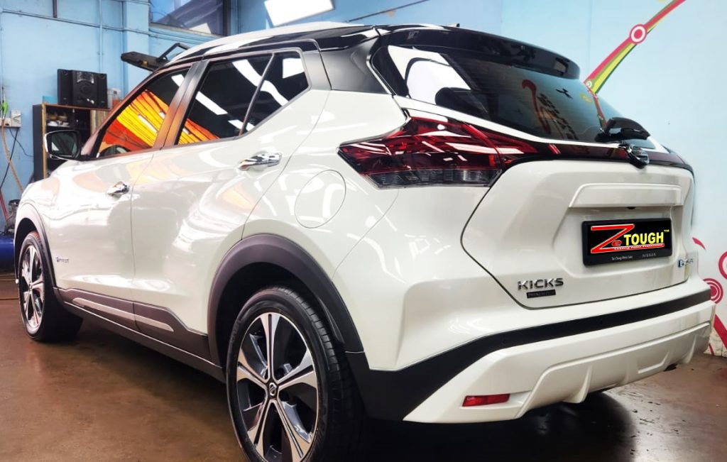 Rear quarter of the Nissan Kicks, glossy and protected.