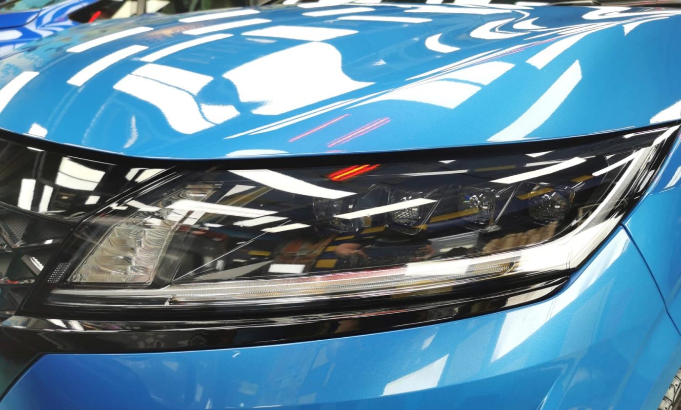 The Note E-Power's coated paintwork showing clean reflections.
