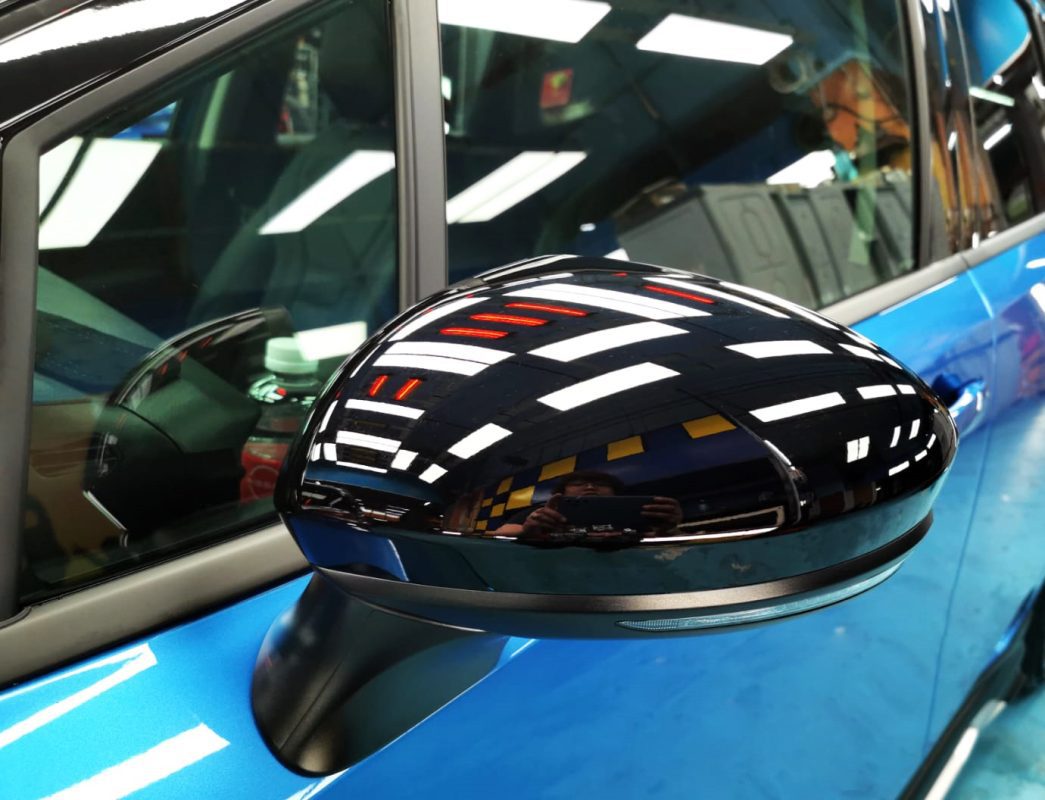 Rear quarter of the Nissan Note E-Power, glossy and protected.
