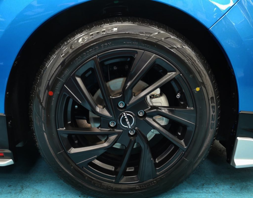 The Nissan Note E-Power parked in the workshop, freshly coated.
