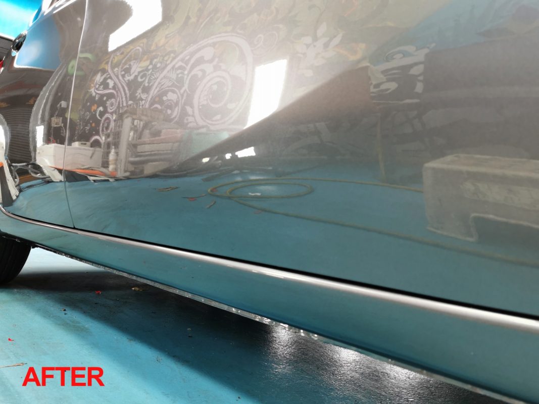 The polished paintwork on the resprayed Note.