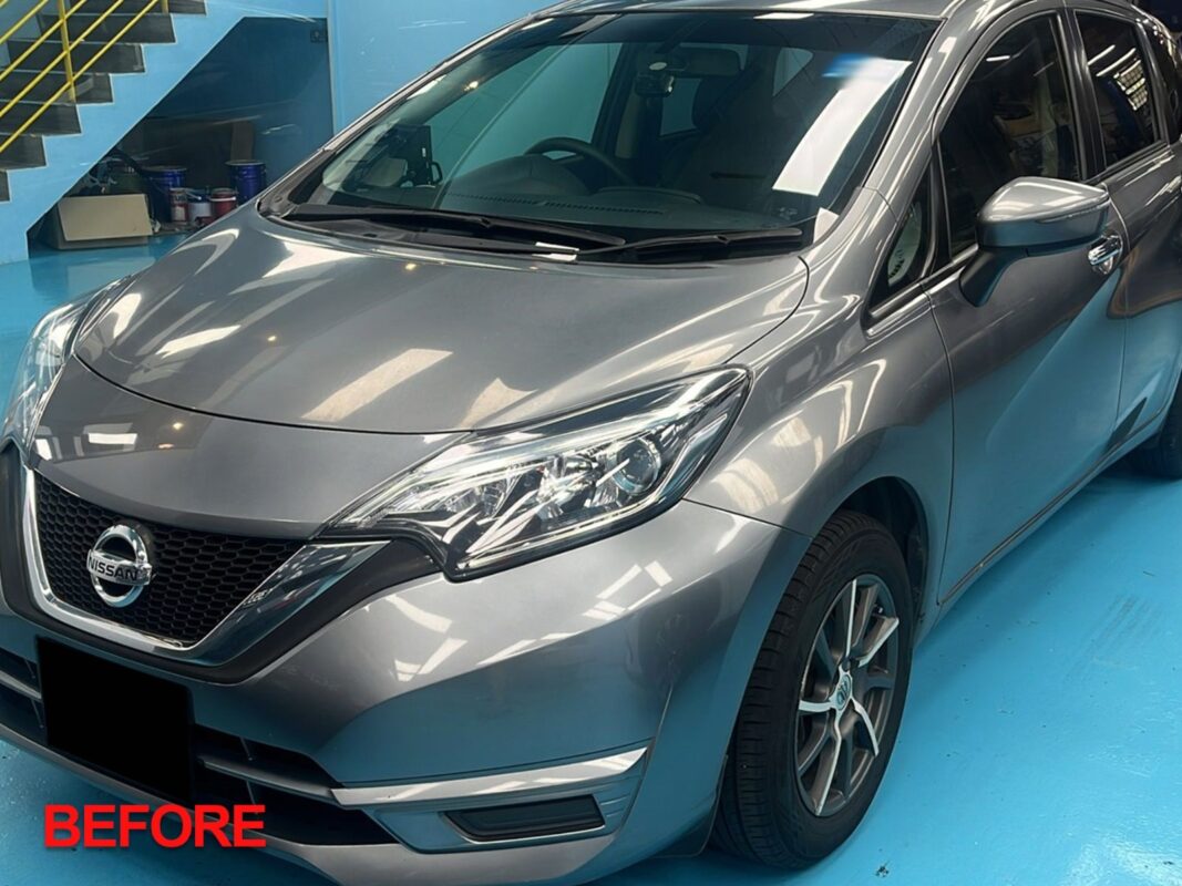 The Nissan Note in the workshop after reassembly, interior groomed.